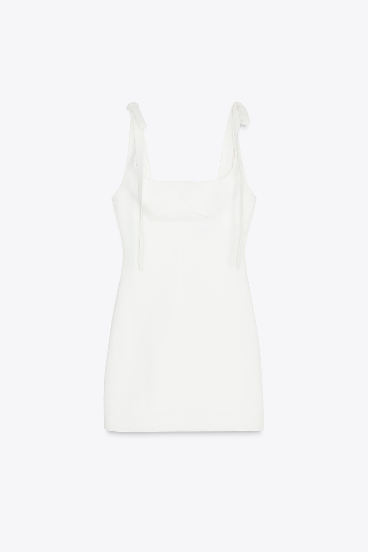 Sweater, Mini Dress, and Suede Boots — The Outfit Everyone Is Wearing Right Now